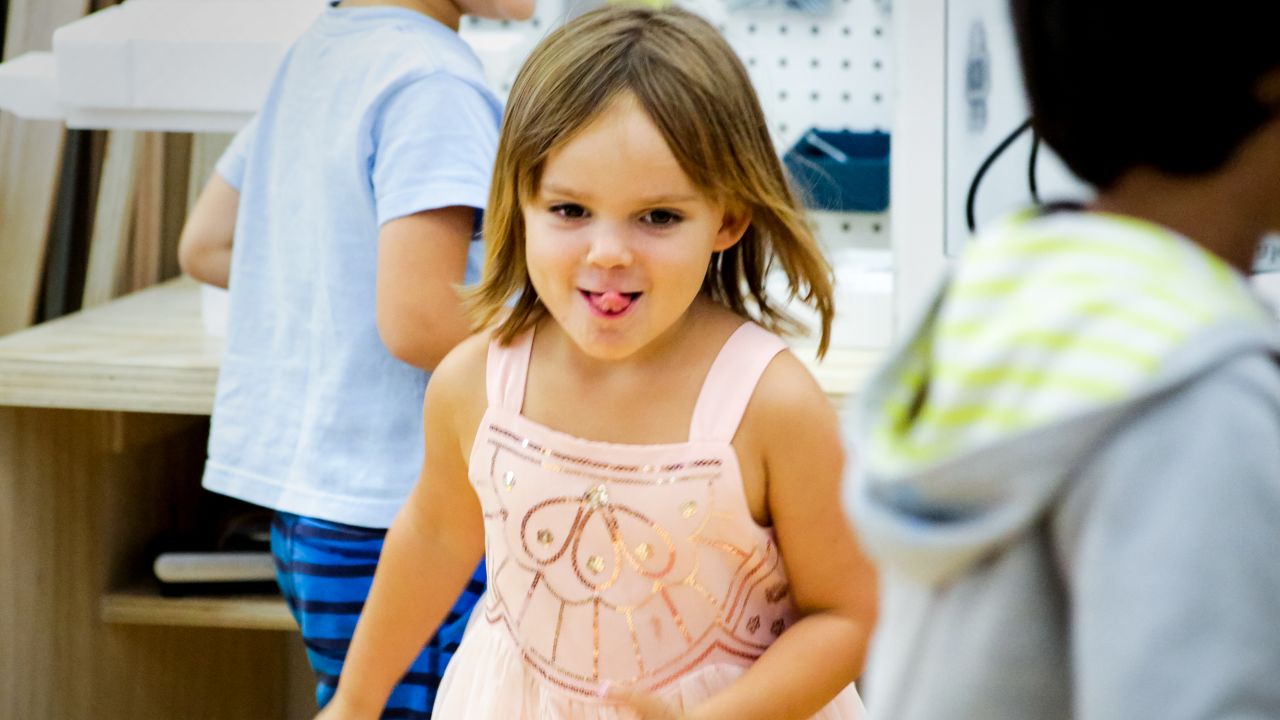 A little girl plays at the Portfolio school, which opened a year ago.