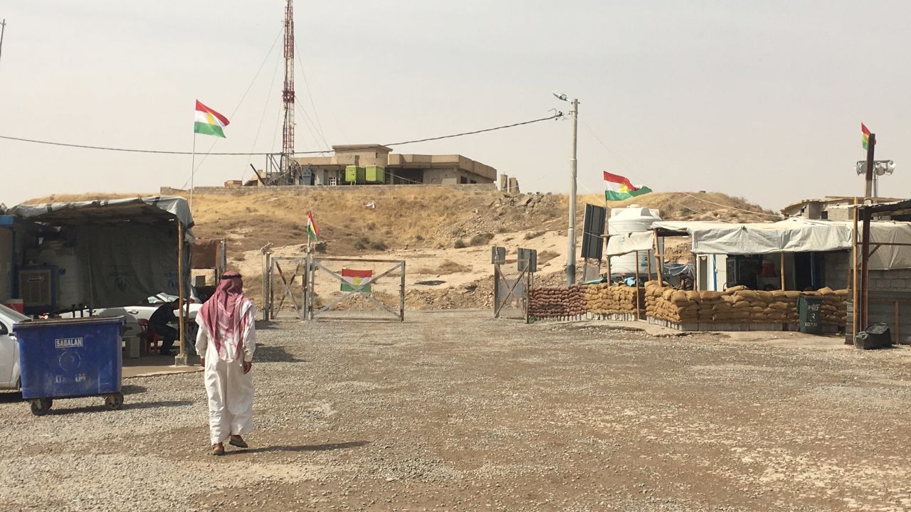 A man walks through a refugee camp in Iraqi Kurdistan.