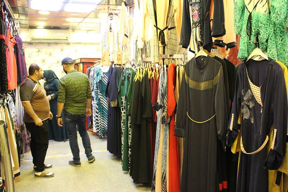 An array of woman's clothes for sale in a Mosul store.