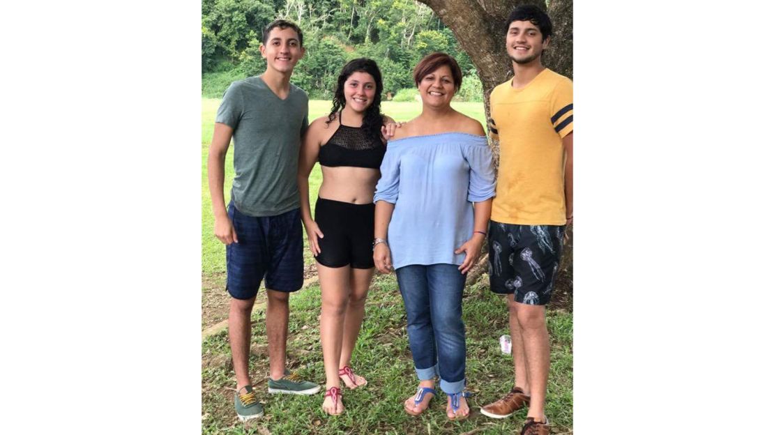 Ivonne Mercado still has not heard from Raquel Mercado, second from right, or her children.