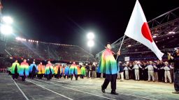 15 Sep 2000: Flag Bearer and Judo competitor Kosei Inoue leads the Japan Olympic Team round during the Opening Ceremony of the Sydney 2000 Olympic Games at the Olympic Stadium in Homebush Bay, Sydney, Australia. Mandatory Credit: Jed Jacobsohn /Allsport