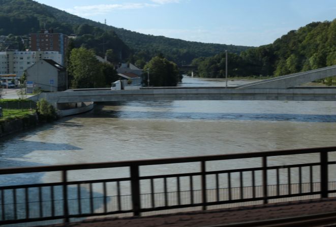 <strong>Grandpa's photos -- Aare River, Olten, Switzerland -- present day:</strong> Seeing scenes move from photograph to reality is always special for Tomkins. "Walking into this scene that you've been staring at for five years is just amazing," he says.