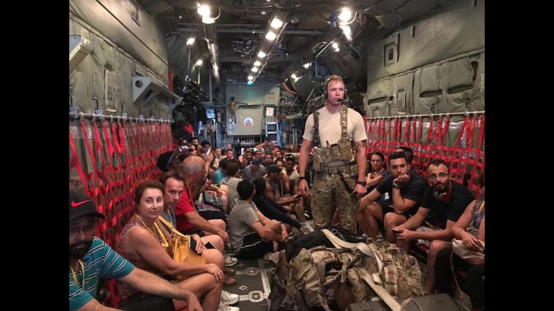 The New York Air National Guard helps American citizens evacuate the Caribbean island of St. Martin on Friday, September 8. St. Martin was among <a  target="_blank">several islands that were devastated</a> by Hurricane Irma.