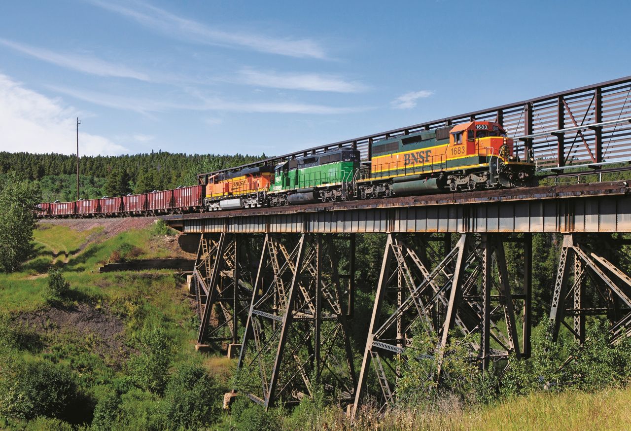 <strong>BNSF SD40-2s1683, Marias Pass Summit to East Glacier, Montana</strong>: Railways in America are also notable for still being run by private companies: "They have remained private companies throughout," says Lewis. "Each with their own unique paint scheme and different operating cultures."