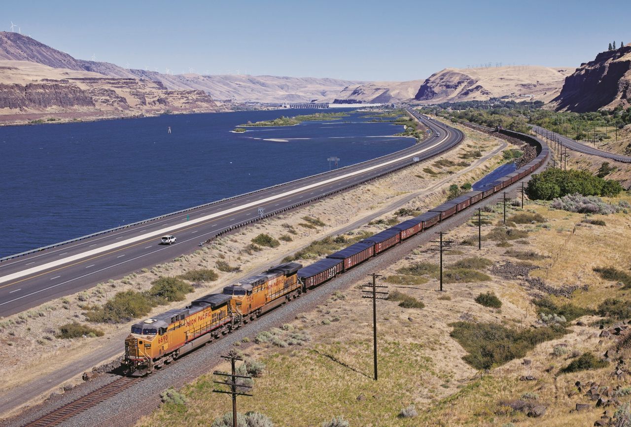 Lewis tries to get the whole train in the image whenever possible, as in this photo of a Union Pacific train in Oregon.
