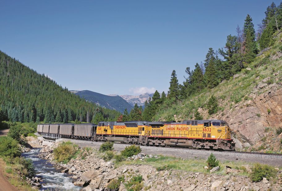 <strong>Locomotives of the Western United States</strong>: The first American transcontinental railroad was completed in 1869. Many original tracks remain in use -- but since the decline of the American passenger service, they're mostly frequented by freight trains, such as this Union Pacific AC4400CW 6632 train at Moffat Tunnel, Rollinsville, Colorado.