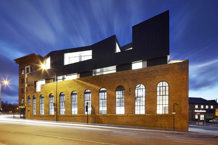 This parasitic property in Sheffield, England, saw a Victorian-era industrial building transformed into a vibrant space. The extension houses a double-height restaurant and bar, plus office units.
