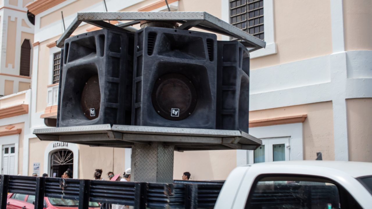 A truck with speakers broadcasts what news there is around Vieques.