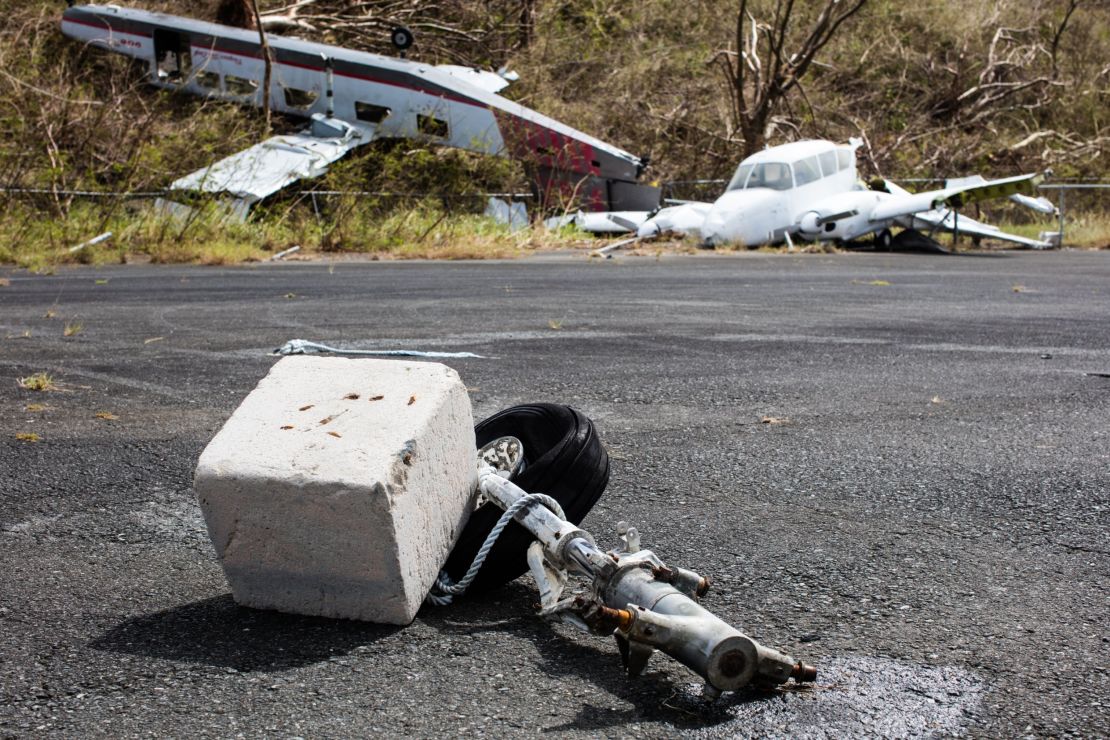 Planes at the airport were broken and tossed around by the storm.