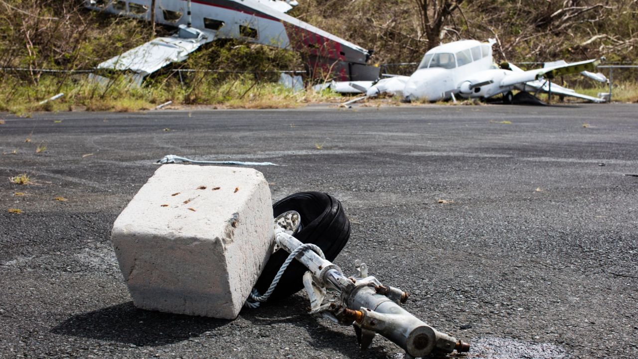 Planes at the airport were broken and tossed around by the storm.