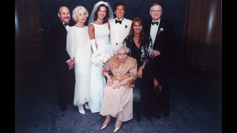 Hefner poses with his daughter Christie, then CEO of Playboy, at her wedding to former Illinois state senator William Marovitz in 1995. 