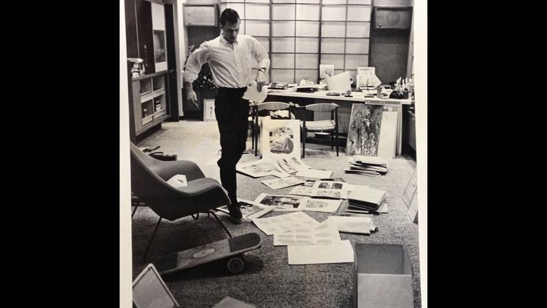 Hefner was intimately involved in the early days of Playboy magazine. This photo shared by him on Instagram shows Hefner hopping through a chaos of paper in his office to take a phone call in 1962. 