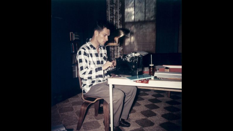 Hugh Hefner works on a typewriter in an undated file photo. Between 1951-1952, Hefner worked as a promotional copywriter for Esquire magazine.