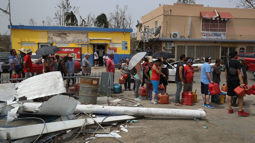 COROZAL, PUERTO RICO - SEPTEMBER 27:  People wait in line for gas as they deal with the aftermath of Hurricane Maria on September 27, 2017 in Corozal, Puerto Rico.  Puerto Rico experienced widespread, severe damage including most of the electrical, gas and water grids as well as agricultural destruction after Hurricane Maria, a category 4 hurricane, passed through.  (Photo by Joe Raedle/Getty Images)