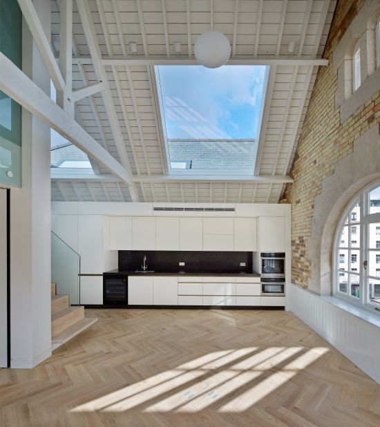 London studio Emry's Architect converted two warehouses into six luxury flats in Covent Garden. 