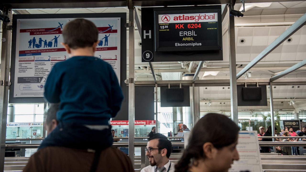 Passengers flying to Erbil wait at Ataturk International airport in Istanbul on Thursday.