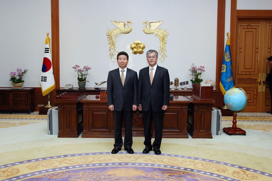 In 2003, when friend and colleague Roh Moo-hyun (left) was elected as president, Moon agreed to serve as his chief of staff.