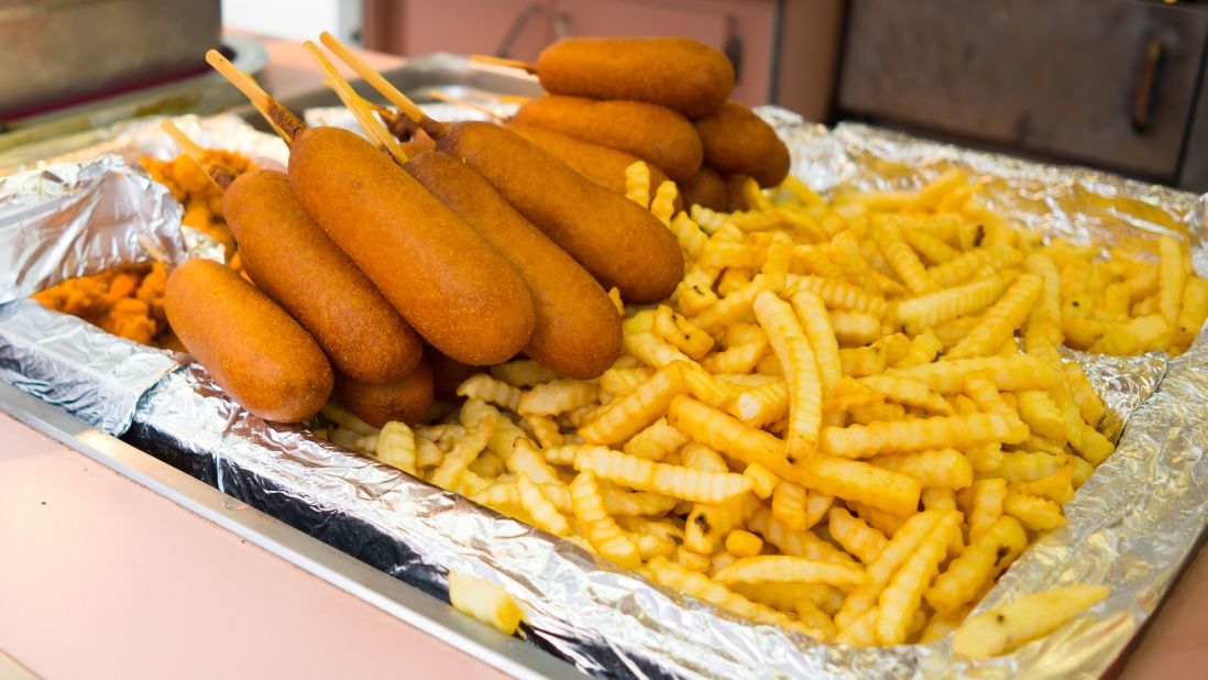 <strong>Corn dogs: </strong>Geary himself created the corn dog for Disneyland in the 1980s.