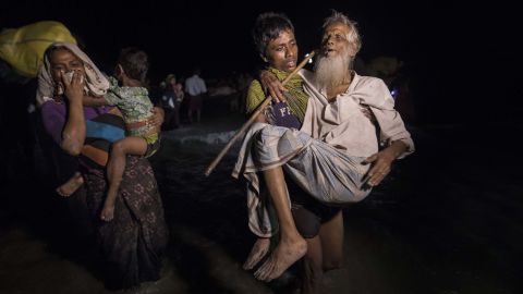 Hundreds of Rohingya arrive in Bangladesh by boat under cover of darkness on September 26, 2017.