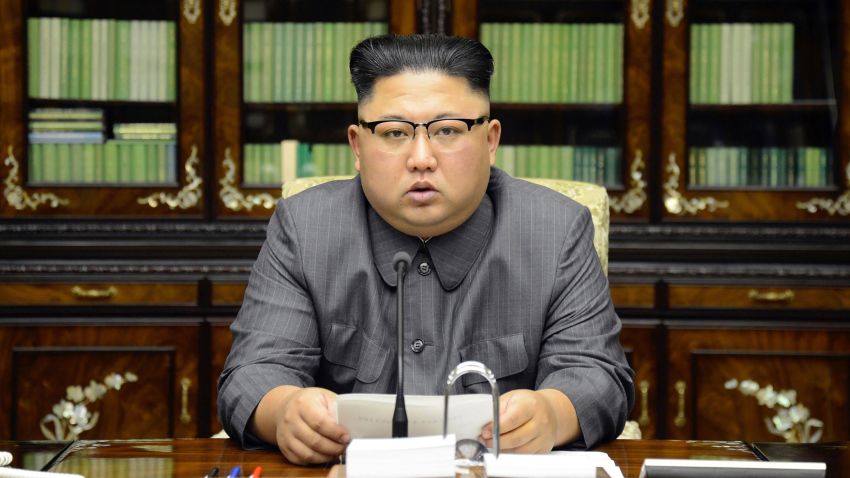 TOPSHOT - This picture taken on September 21, 2017 and released from North Korea's official Korean Central News Agency (KCNA) on September 22 shows North Korean leader Kim Jong-Un delivering a statement in Pyongyan as regards to a speech made by the president of the United States of America at the UN General Assembly.US President Donald Trump is "mentally deranged" and will "pay dearly" for his threat to destroy North Korea, Kim Jong-Un said, in an unprecedented personal attack published hours after Washington vowed tougher sanctions over Pyongyang's nuclear programme. / AFP PHOTO / KCNA VIA KNS / STR / South Korea OUT / REPUBLIC OF KOREA OUT   ---EDITORS NOTE--- RESTRICTED TO EDITORIAL USE - MANDATORY CREDIT "AFP PHOTO/KCNA VIA KNS" - NO MARKETING NO ADVERTISING CAMPAIGNS - DISTRIBUTED AS A SERVICE TO CLIENTSTHIS PICTURE WAS MADE AVAILABLE BY A THIRD PARTY. AFP CAN NOT INDEPENDENTLY VERIFY THE AUTHENTICITY, LOCATION, DATE AND CONTENT OF THIS IMAGE. THIS PHOTO IS DISTRIBUTED EXACTLY AS RECEIVED BY AFP.  /          (Photo credit should read STR/AFP/Getty Images)