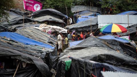 Rohingya Muslim refugees line up in Kutupalong refugee camp in the Bangladeshi district of Ukhia on September 28.