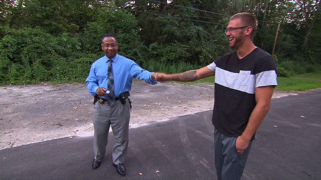 Beyond the Call: Sheriff's deputy sheds uniform to save lives  Ohio has been particularly hard hit by the opioid crisis, and sheriff deputies in one county have come up with an innovative idea: they've shed their uniforms and their patrol cars to help addicts.  Twenty officers at the Lucas County Drug Abuse Response Team visit emergency rooms to greet addicts as they come out of their overdose. Addicts are notoriously resistant to help, but the DART team has found they're much more receptive when the person they see bedside is in plain clothes and comes across as more of a buddy than an authority figure. The officers also keep up with the addicts as they try to build a new life, and when they visit them at home, it's in a regular car, not a cop car. Over the past three years, they've responded to at least 2,300 people who've overdosed, and nearly 80% have gone to detox. We accompany DART team member Charles Johnson as he rushes to ER's in the Toledo area, and as he visits recovering addicts who are trying to rebuild their lives.