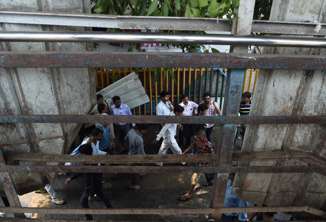 Commuters enter into Prabhadevi station. The area around the station has undergone rapid urban growth in recent years. 