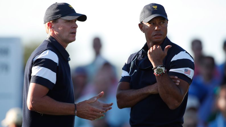Fourteen-time major winner Tiger Woods -- pictured talking to US Team  captain Steve Stricker -- is an assistant in the American team, along with Fred Couples, Davis Love and Jim Furyk. 