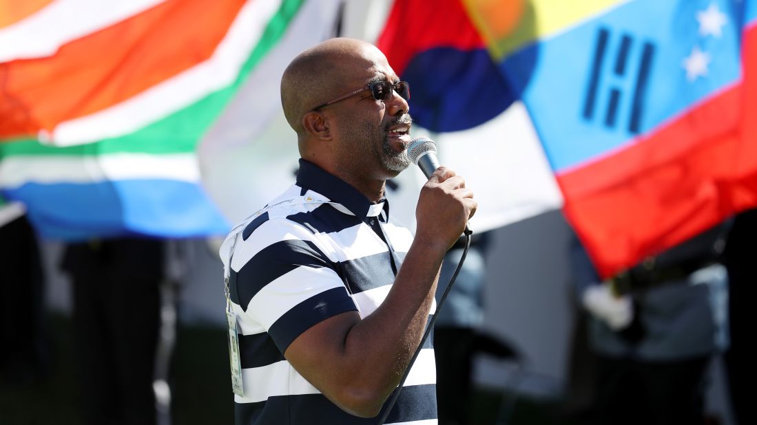 Darius Rucker sings the National Anthem prior to Thursday foursome matches. The Presidents Cup involves 11 players from the US taking on 11 of the best players from outside the US and Europe. 