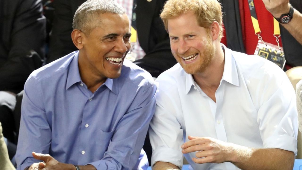 Barack Obama and Prince Harry share at laugh at this year's Invictus Games in Canada. 
