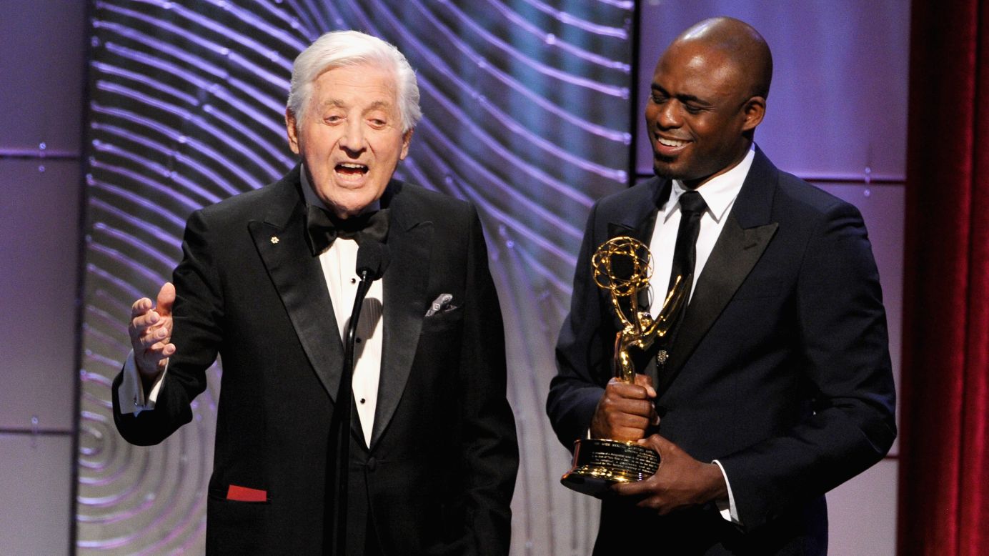 TV personality Wayne Brady presents Monty Hall with The Lifetime Achievement Award onstage during the 40th Annual Daytime Emmy Awards  on June 16, 2013, in Beverly Hills.  