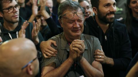 A member of the Catalan National Assembly cries at the end of the voting day on October 1.