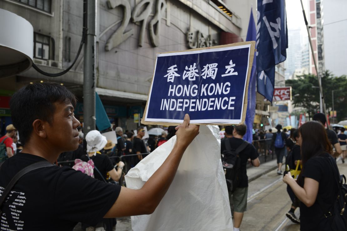 A pro-independence activist marches in Hong Kong's Admiralty district on October 1. 