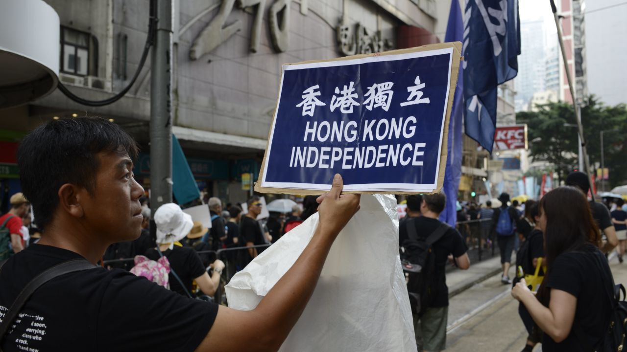 A pro-independence activist marches in Hong Kong's Admiralty district on October 1.