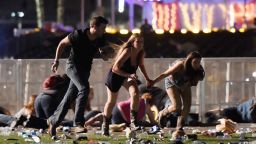 People run from the Route 91 Harvest country music festival after gun fire was heard on October 1, 2017 in Las Vegas, Nevada. 