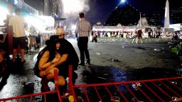 LAS VEGAS, NV - OCTOBER 01:  People take cover at the Route 91 Harvest country music festival after apparent gun fire was heard on October 1, 2017 in Las Vegas, Nevada.  There are reports of an active shooter around the Mandalay Bay Resort and Casino.  (Photo by David Becker/Getty Images)