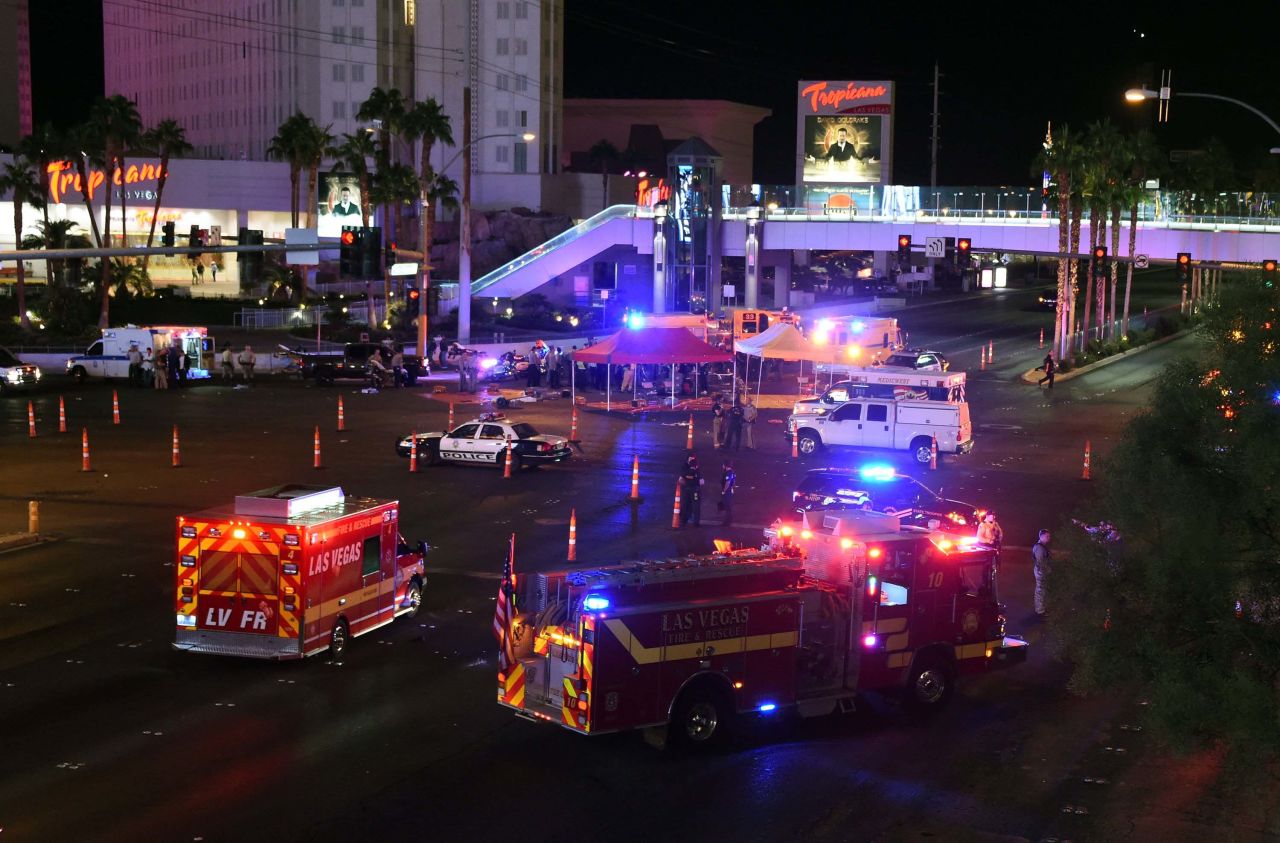 Police and emergency responders gather at the intersection of Las Vegas Boulevard and Tropicana Avenue.