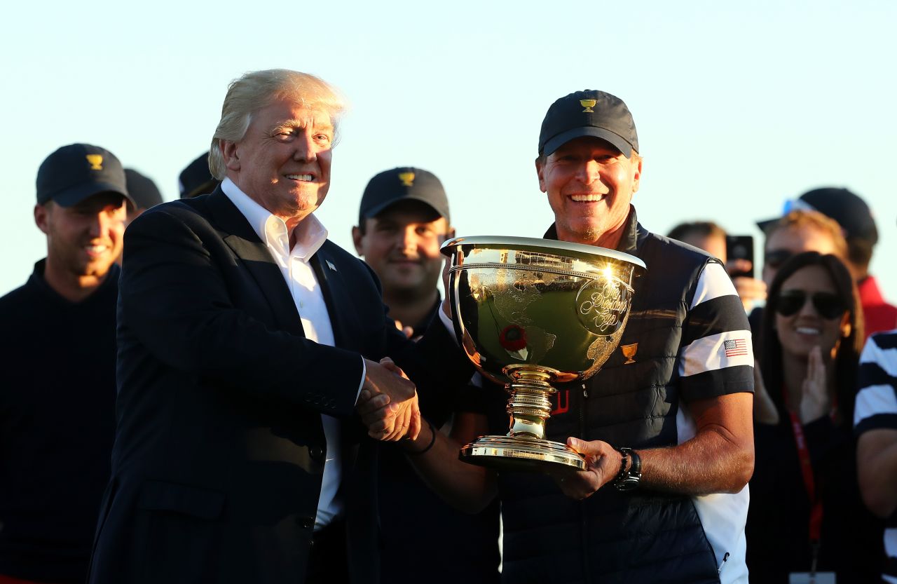 US president Donald Trump was on hand at the Liberty National Golf Club Sunday to present the Presidents Cup trophy to the US team. The US had beaten the International team 19-11 over the four days of competition.