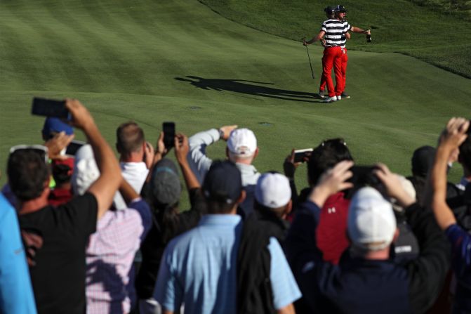 It was Daniel Berger who had the honor of clinching the Cup, his win against Si Woo Kim of South Korea in Sunday's singles matches enough to seal a US triumph. Berger was embraced by teammate Charley Hoffman.