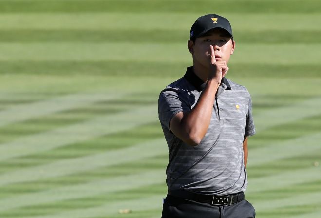 Although it was ultimately a comfortable win for the US, the International team -- captained by Nick Price -- did fightback on the final day, winning six of the 12 matches. Kim silences the crowd on the 11th green during his match with Berger.