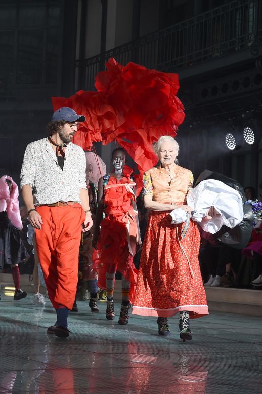 British institution Dame Vivienne Westwood and her husband and collaborator Andreas Kronthaler, lead the way during the finale.