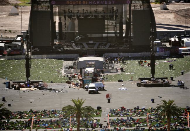 Debris is scattered on the ground Monday, October 2, at the site of a country music festival held this past weekend in Las Vegas. Dozens of people were killed and hundreds were injured Sunday when <a href="index.php?page=&url=http%3A%2F%2Fwww.cnn.com%2F2017%2F10%2F02%2Fus%2Flas-vegas-shooter%2Findex.html" target="_blank">a gunman opened fire</a> on the crowd. Police said the gunman fired from the Mandalay Bay hotel, several hundred feet southwest of the concert grounds. It is the deadliest mass shooting in modern US history.