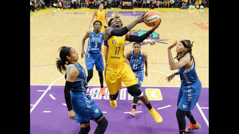 Essence Carson drives to the basket for Los Angeles during Game 4 of the WNBA Finals on Sunday, October 1. Minnesota won the game to force a decisive Game 5, which will take place on Wednesday. 