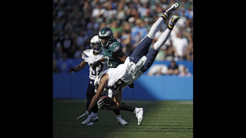 Los Angeles Chargers wide receiver Tyrell Williams lands after leaping over a Philadelphia linebacker on Sunday, October 1.