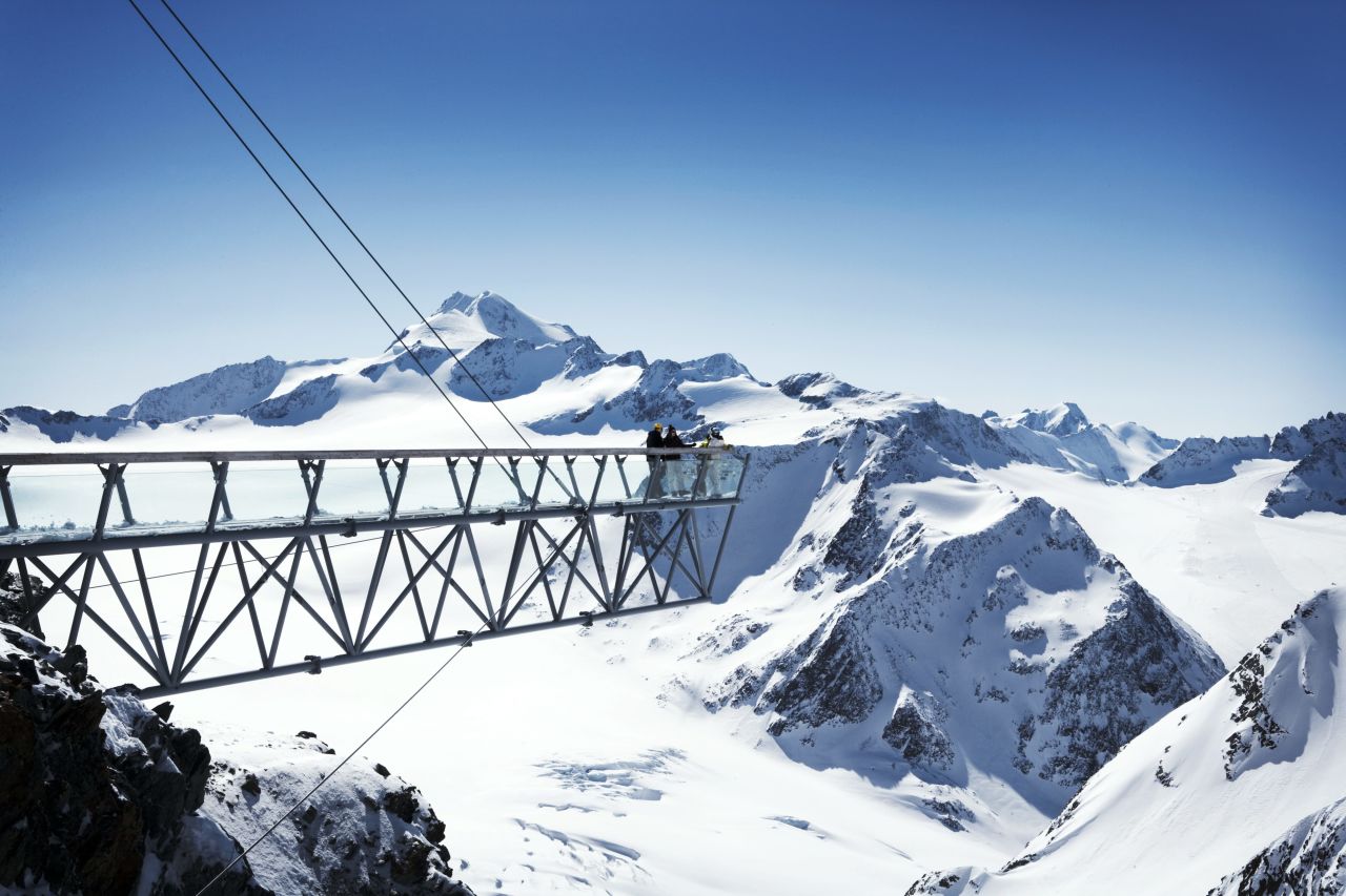 Above the Tiefenbach glacier a 15-meter pyramid stands sentinel over a steel and glass footbridge which extends 20 meters over a gaping abyss with the glacier far below and offers up-close views of the Wildspitze.