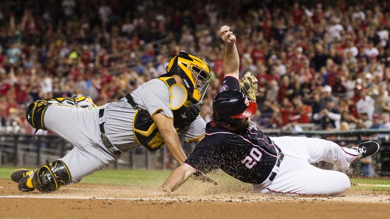 Pittsburgh catcher Elias Diaz tags out Washington's Daniel Murphy during a play at the plate on Friday, September 29.