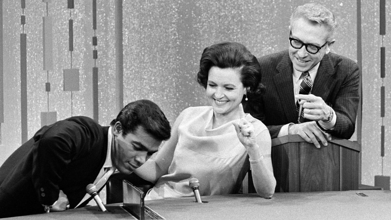 White appears as a celebrity guest on the game show "Password" in 1967. The actress was married to "Password" host Allen Ludden, right, from 1963 until his death in 1981. 