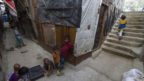 Young children play games in Kanchan Kunj. The makeshift village is one of four Rohingya settlements in Delhi.