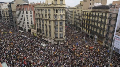 Protesters gather at the Placa de la Universitat square in Barcelona in Tuesday's day of protest against police violence.