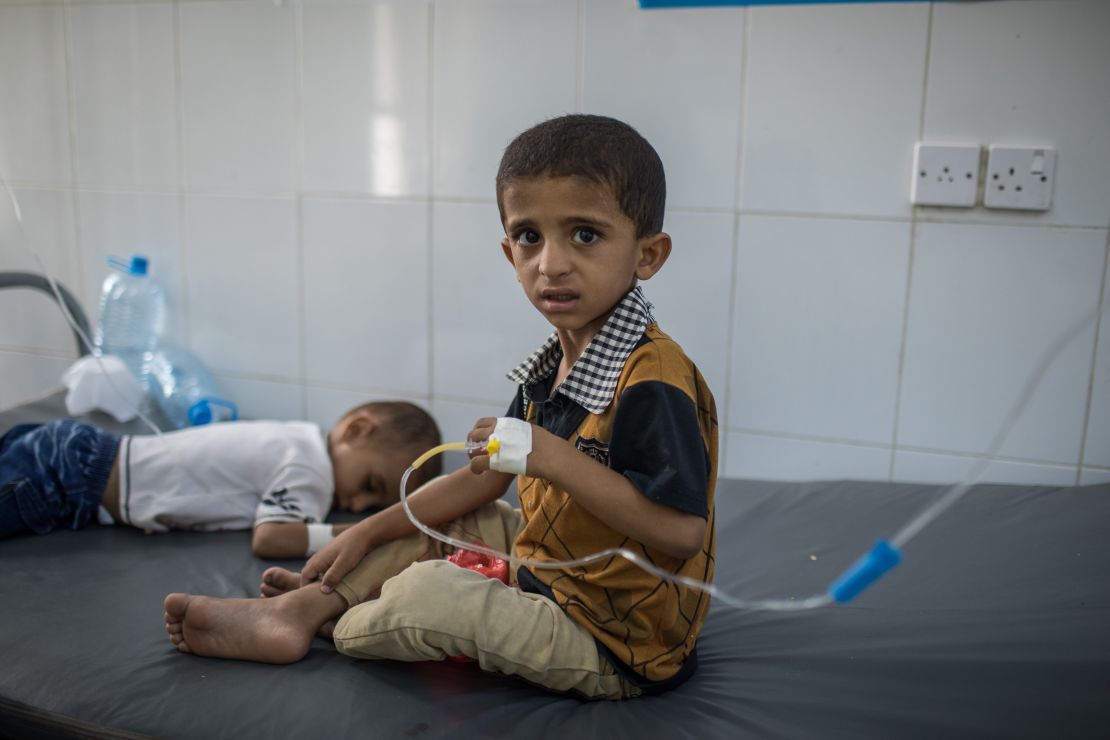 Mohammed Alawi Hadi, 6, and his brother Salih Alawi Hadi, 3, are treated for cholera at a hospital in Aden.